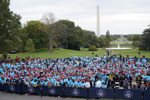 A crowd of President Donald Trump supporters gather on the South Lawn to listen to Trump speak Saturday, Oct. 10, 2020, in Washington. (AP Photo/Alex Brandon)
Donald Trump