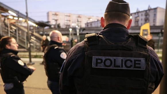 French Interior Minister Visits Law Enforcement Ahead Of New Year s Eve - France French police officers man a controle checkpoint at Garges-Sarcelles train station ahead of New Year s Eve, in Garges-l ...