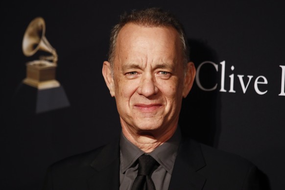 epa10448400 US actor Tom Hanks attends the Pre-Grammy Gala at The Beverly Hilton in Beverly Hills, California, USA, 04 February 2023. EPA/CAROLINE BREHMAN