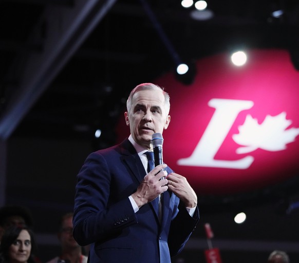 Liberal Party of Canada leadership candidate Mark Carney delivers a speech as he&#039;s introduced during the Liberal leadership announcement in Ottawa, Ontario, Sunday, March 9, 2025. (Justin Tang/Th ...
