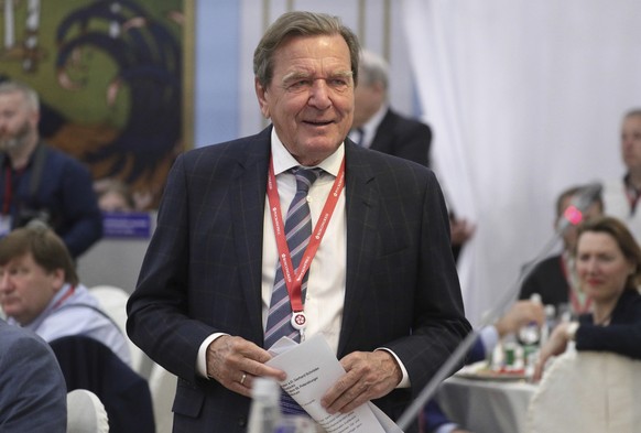 FILE - Former German Chancellor Gerhard Schroeder arrives to attend the St. Petersburg International Economic Forum in St. Petersburg, Russia, June 7, 2019. German Chancellor Olaf Scholz has on Thursd ...