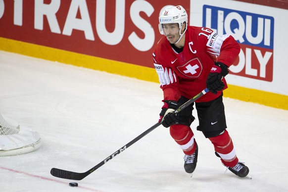 Switzerland&#039;s defender Raphael Diaz controls the puck, during the IIHF 2021 World Championship preliminary round game between Switzerland and Great Britain, at the Olympic Sports Center, in Riga, ...
