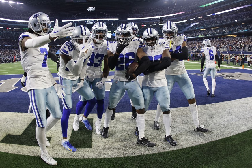 Dallas Cowboys&#039; DaRon Bland celebrates his interception with teammates during the second half of an NFL football game against the Philadelphia Eagles Saturday, Dec. 24, 2022, in Arlington, Texas. ...