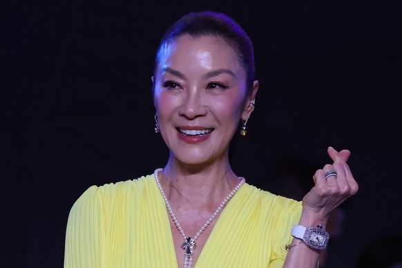 epa12623292 Oscar-winning actress Michelle Yeoh reacts during an event as part of the national launch of Visit Malaysia 2026 in Kuala Lumpur, Malaysia, 03 January 2026. Starting 1st January, states ac ...