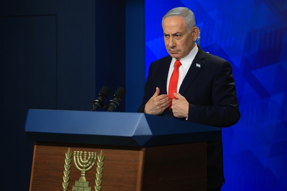 epa13039764 Israeli Prime Minister Benjamin Netanyahu holds a news conference in Jerusalem, 15 June 2026, following the announcement of a US-Iran mediated preliminary framework to end regional militar ...