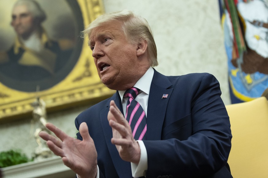 President Donald Trump speaks during a meeting with Paraguay&#039;s President Mario Abdo Benitez in the Oval Office of the White House, Friday, Dec. 13, 2019, in Washington. (AP Photo/ Evan Vucci)
Don ...