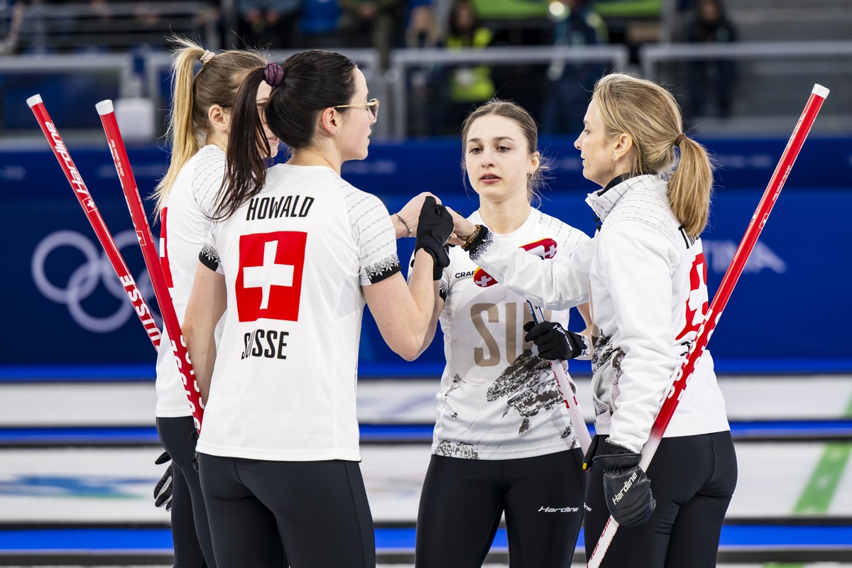 Alina Paetz, Carole Howald, Selina Witschonke and Silvana Tirinzoni of Switzerland, from left to right, react during the women's curling semi-final game between Switzerland and USA at the 2026 Ol ...