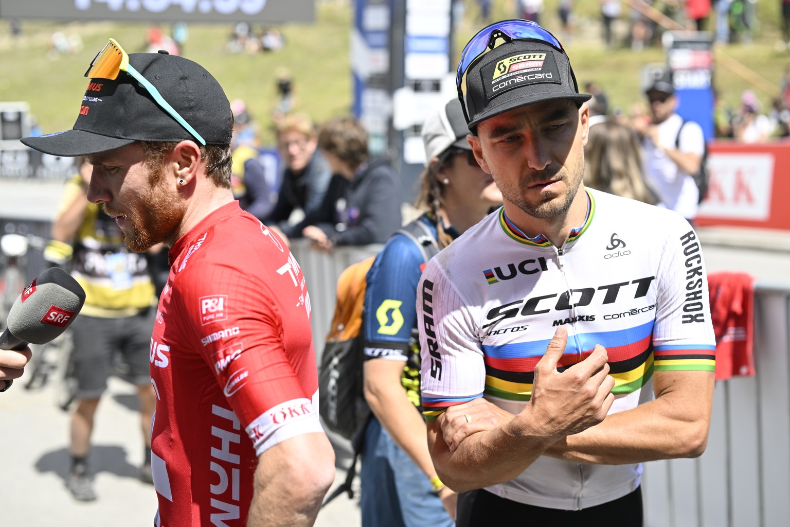 Nino Schurter of Switzerland, right, and Mathias Flueckiger of Switzerland, left, after the UCI Cross Country Mountain Bike race, on Sunday, July 10, 2022, in Lenzerheide, Switzerland. (KEYSTONE/Gian  ...