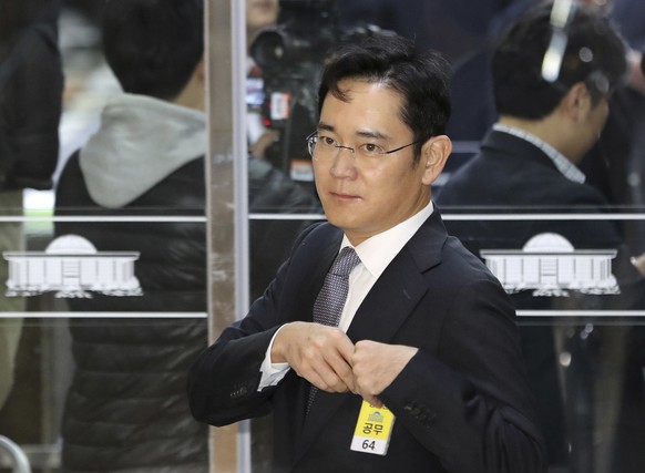 FILE - In this Dec, 6, 2016 file photo, Lee Jae-yong, a vice chairman of Samsung Electronics Co. arrives for hearing at the National Assembly in Seoul, South Korea. The special prosecutors office said ...