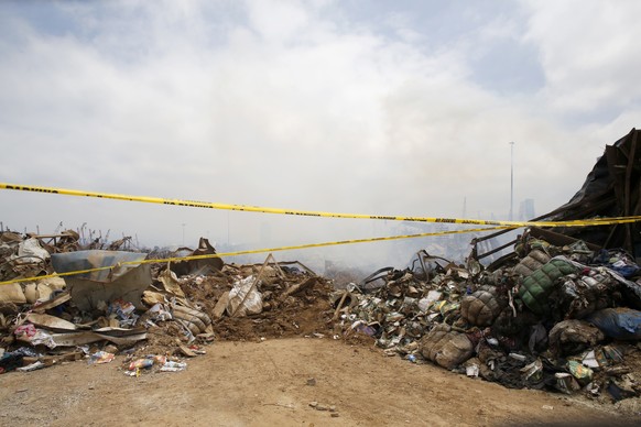 The devastated site of the explosion at the port of Beirut, Lebanon, is pictured Thursday Aug.6, 2020. French President Emmanuel Macron has arrived in Beirut to offer French support to Lebanon after t ...