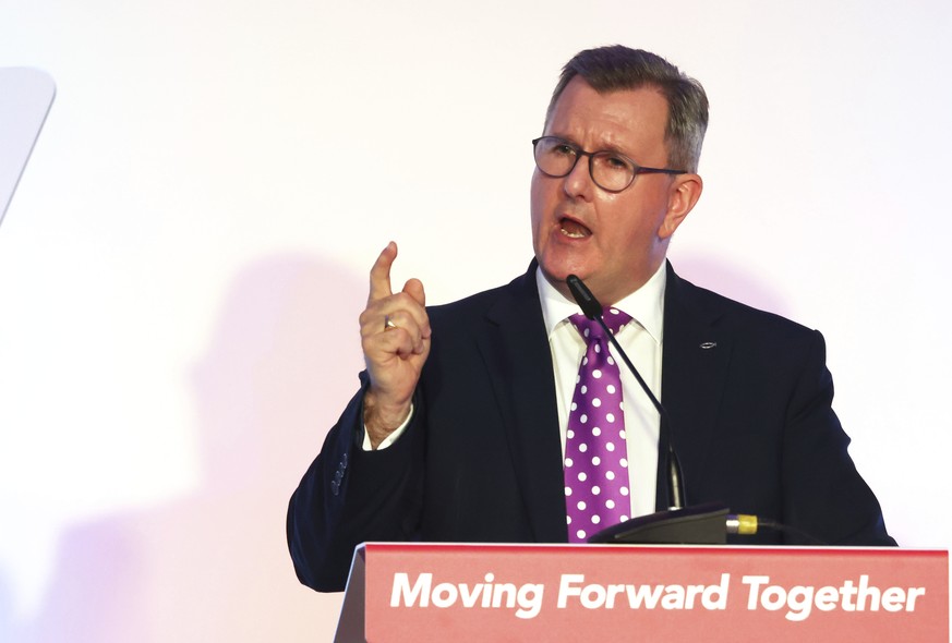 Leader of the Democratic Unionist Party Jeffrey Donaldson speaks to party delegates during the DUP party conference in Belfast on Saturday, Oct. 8, 2022, as members met for its first annual conference ...