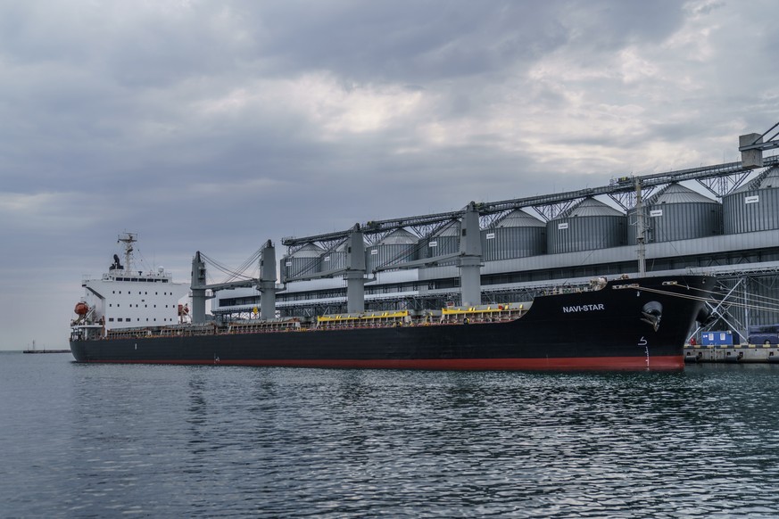 FILE - The ship Navi-Star sits full of grain since Russia&#039;s invasion of Ukraine began five months ago as it waits to sail from the Odesa Sea Port, in Odesa, Ukraine, July 29, 2022. U.S. President ...