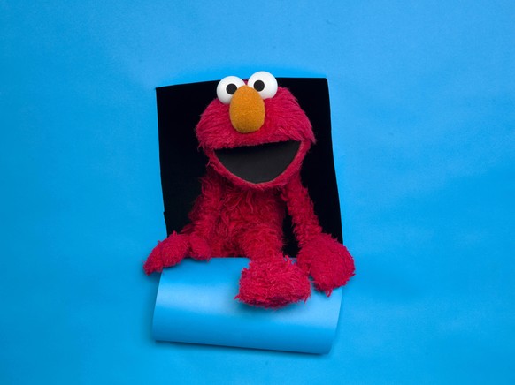 FILE - Elmo of the film &quot;Being Elmo&quot; poses for a portrait in the Fender Music Lodge during the 2011 Sundance Film Festival in Park City, Utah on Jan. 24, 2011. (AP Photo/Victoria Will, File) ...