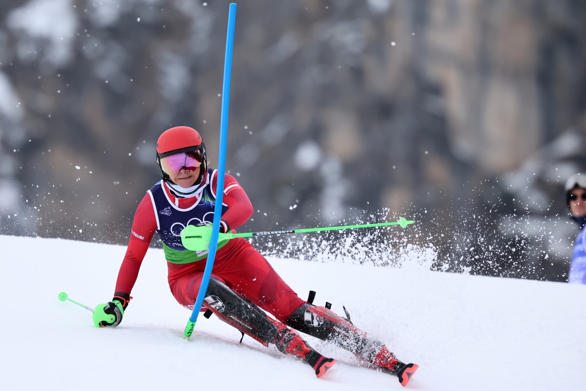 Austria's Katharina Huber speeds down the course during an alpine ski, slalom portion of a women's team combined race, at the 2026 Winter Olympics, in Cortina d'Ampezzo, Italy, Tuesday, ...