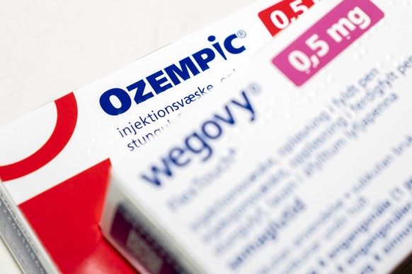 epa10538865 Packages of prescribtion drugs Ozempic and Wegovy by Novo Nordisk sit on a table in Copenhagen, Denmark, 23 March 2023. US celebrities have credited their weight loss to the FDA-approved m ...