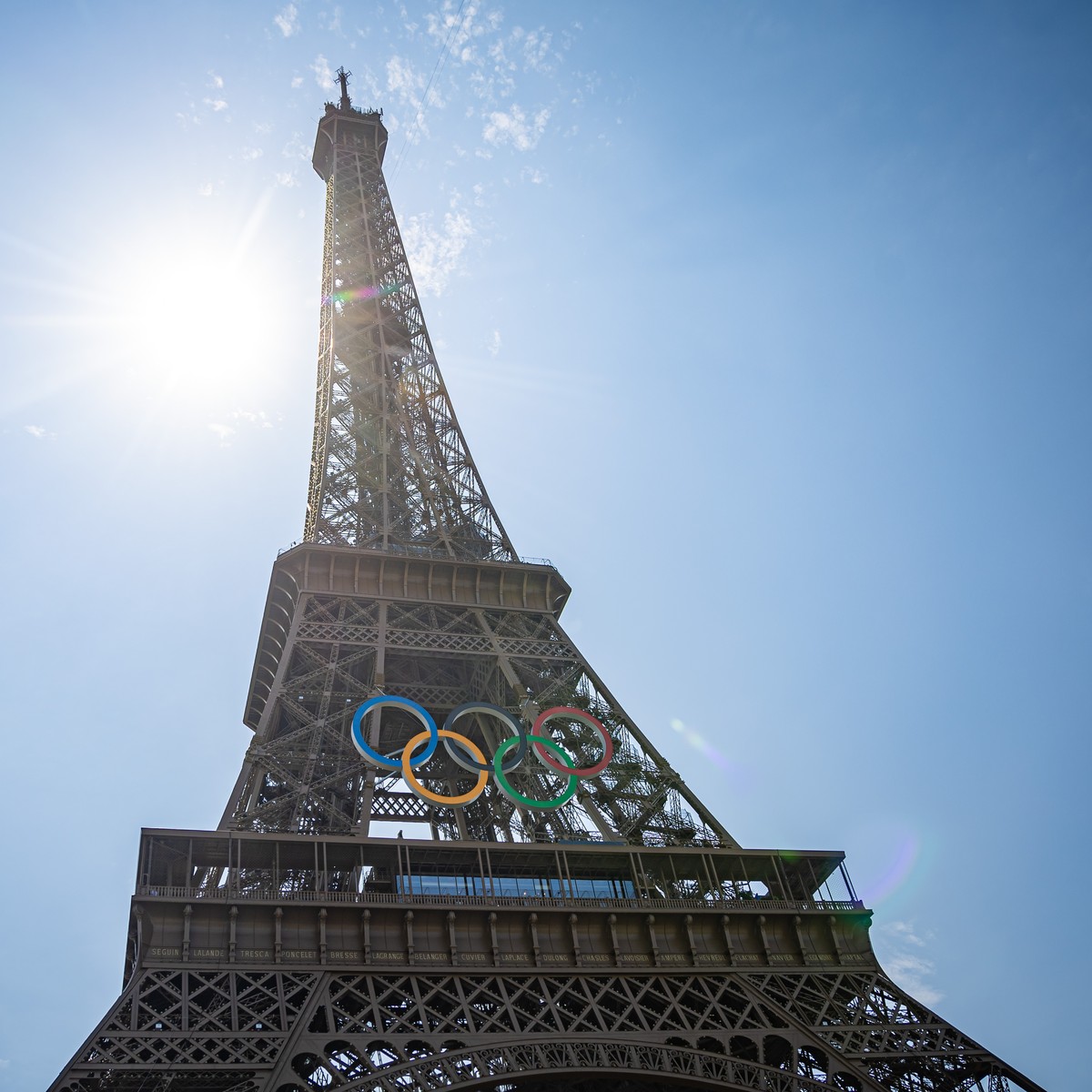 epa11487631 The Eiffel Tower is decorated with the Olympic Rings in Paris, France, 19 July 2024. From 18 to 26 July, the day of the Opening Ceremony of the Paris 2024 Olympic Games, security measures  ...