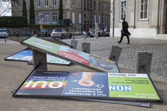 Information panels for voting are fallen be caused by storm Ciara, in the Old city of Geneva, Switzerland, Monday, February 10, 2020. Severe warnings have been issued for Western and Northern Europe as storm Ciara (also known as Sabine in Germany, and Switzerland and Elsa in Norway) is bringing strong winds and heavy rains causing disruption of land and air traffic. Winter storm Ciara reached Switzerland last night. (KEYSTONE/Salvatore Di Nolfi)