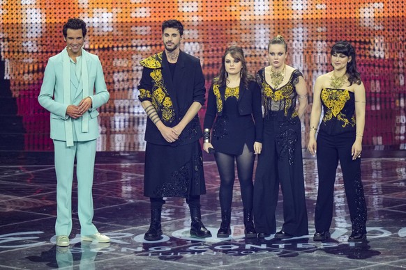 Mika, left, presents finalists Alvan &amp; Ahez from France at the Eurovision Song Contest in Turin, Italy, Tuesday, May 10, 2022. (AP Photo/Luca Bruno)