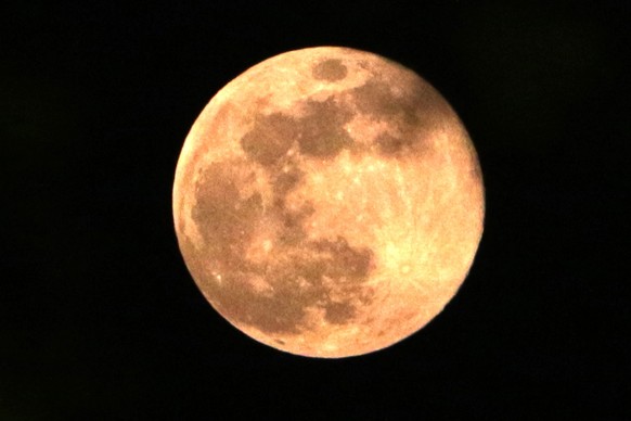 epa12624132 The first full moon of the year, known as the Wolf Moon, above Islamabad, Pakistan, 03 January 2026. EPA/SOHAIL SHAHZAD
