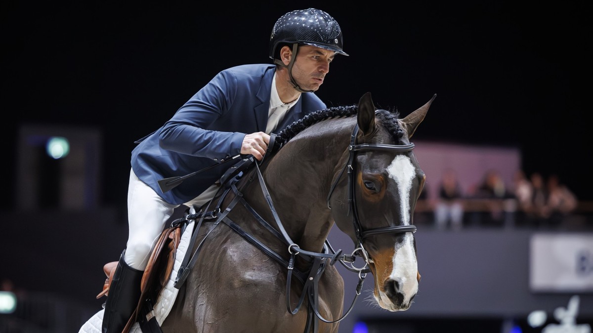 Steve Guerdat from Switzerland rides his horse Dynamix de Belheme during the Rolex Grand Prix at the 63rd CHI international show jumping tournament in Geneva, Switzerland, Sunday, December 15, 2024. ( ...