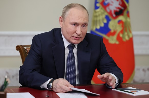 Russian President Vladimir Putin speaks as he takes part in the opening ceremony of new healthcare facilities in several regions of Russia via a videoconference in St. Petersburg, Russia, Saturday, Ju ...