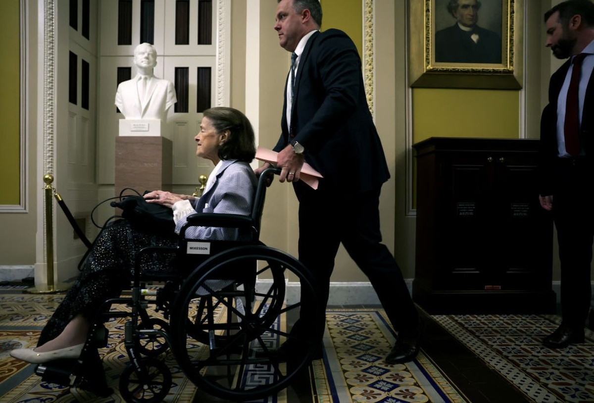 WASHINGTON, DC - JUNE 08: U.S. Sen. Dianne Feinstein (D-CA) sits in a wheel chair as she leaves after a photo session at the U.S. Capitol on Seersucker Thursday, June 8, 2023 in Washington, DC. Senato ...