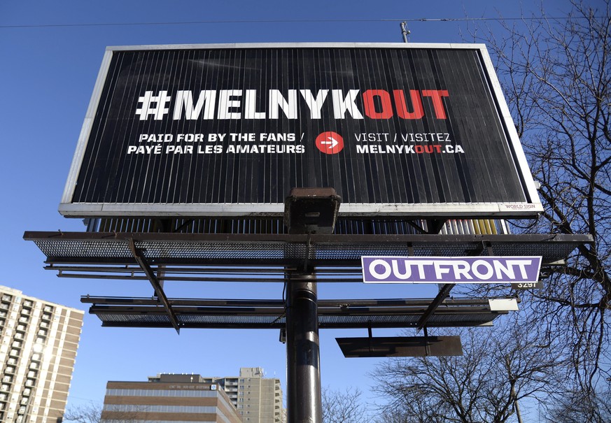 A billboard calling for Ottawa Senators owner Eugene Melnyk to sell the NHL hockey team is seen in Ottawa on Monday, March 19, 2018. (Justin Tang/The Canadian Press via AP)
