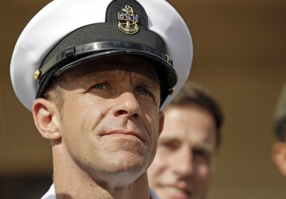 FILE - In this July 2, 2019, file photo, Navy Special Operations Chief Edward Gallagher leaves a military court on Naval Base San Diego. The secretary of the U.S. Navy said Saturday, Nov. 23, he doesn ...