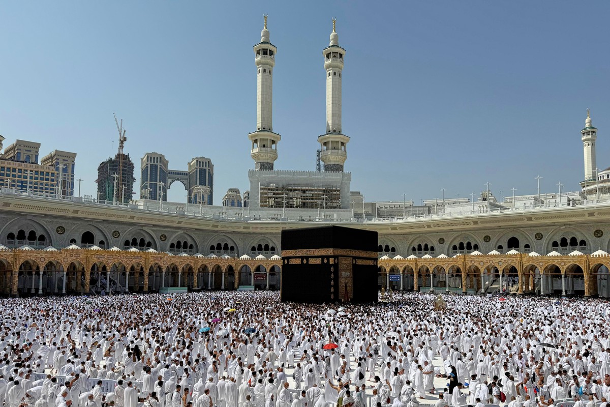Pilgrims pray in front of the Kaaba, Islam's holiest shrine, at the Grand Mosque in the Muslim holy city of Mecca, Saudi Arabia, during the minor pilgrimage, known as Umrah, that can be undertake ...