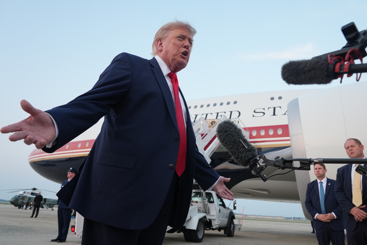 President Donald Trump speaks to reporters as he exits Air Force One at Joint Base Andrews, Md., after attending the World Cup final soccer match, Sunday, July 19, 2026. (AP Photo/Jacquelyn Martin)
Do ...