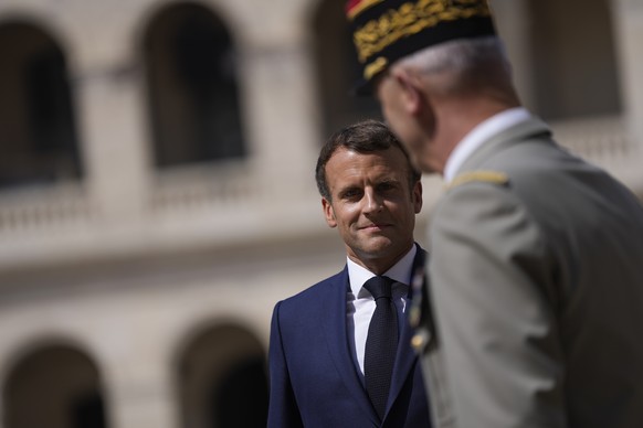 French President Emmanuel Macron attends a farewell ceremony for the French armed forces chief of staff, Gen. Francois Lecointre at the Invalides monument in Paris, Wednesday, July 21, 2021. (AP Photo ...