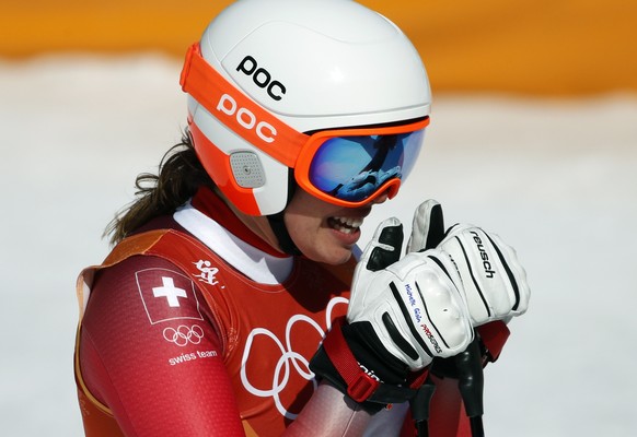 Switzerland&#039;s Michelle Gisin reacts in the finish area of the women&#039;s combined downhill at the 2018 Winter Olympics in Jeongseon, South Korea, Thursday, Feb. 22, 2018. (AP Photo/Christophe E ...