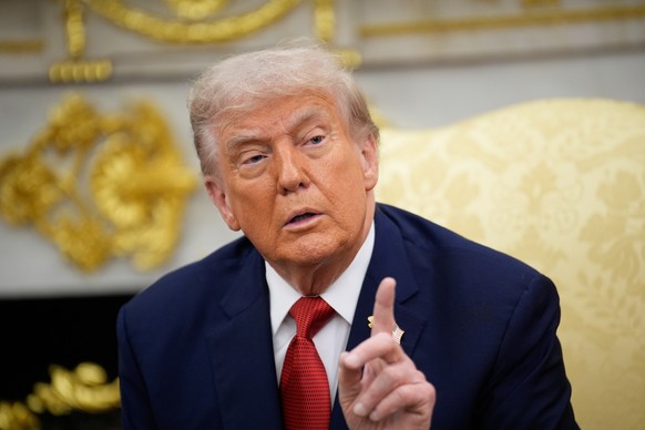 epa12405095 US President Donald Trump gestures as he meets with Turkish President Recep Tayyip Erdogan (not pictured) in the Oval Office of the White House, in Washington, DC, USA, 25 September 2025.  ...