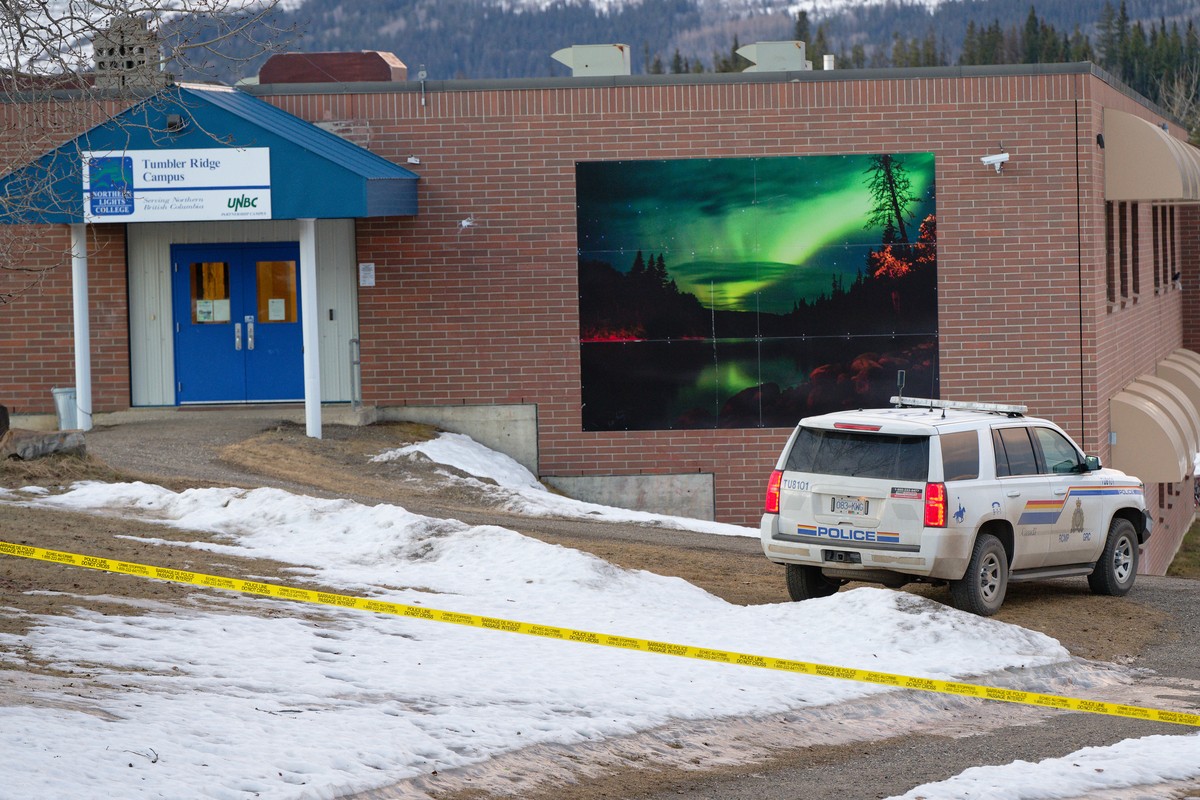 Police began putting tape out near theTumbler Ridge Secondary School and surrounding buildings in Tumbler Ridge, B.C. on Wednesday, Feb. 11, 2026. (Jesse Boily/The Canadian Press via AP)
Canada Shooti ...