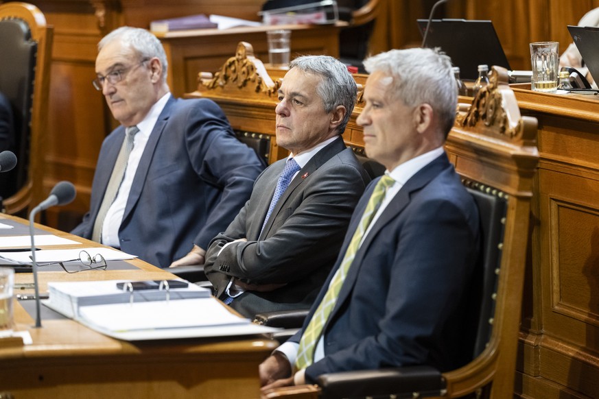 CAPTION CORRECTION: CORRECTS DATE IN TODAY'S PHOTOS OF THE SESSION IN THE STATE COUNCIL - Bundespraesident Guy Parmelin sowie die Bundesraete Ignazio Cassis und Beat Jans, von links, nehmen an de ...