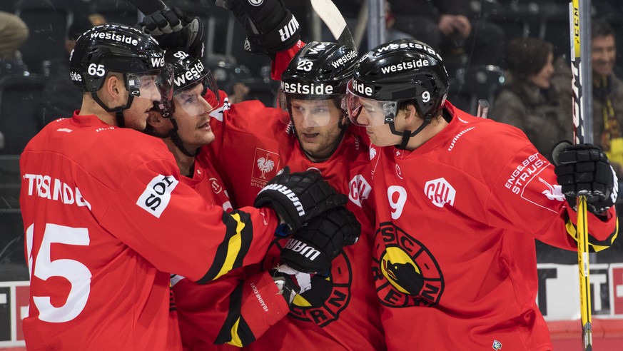 BernÕs Ramon Untersander, BernÕs Gaetan Haas, BernÕs Simon Bodenmann, und BernÕs Mason Raymond, react after scoring a goal (1-0) during the Champions Hockey League group F match between Switzerland&#0 ...