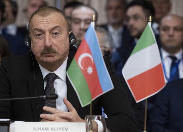 epa08234462 The president of Azerbaijan, Ilham Aliyev, looks on during the Italy-Azerbaijan Business Forum at the Farnesina Palace in Rome, Italy, 21 February 2020. President Aliyev is in Italy for a  ...
