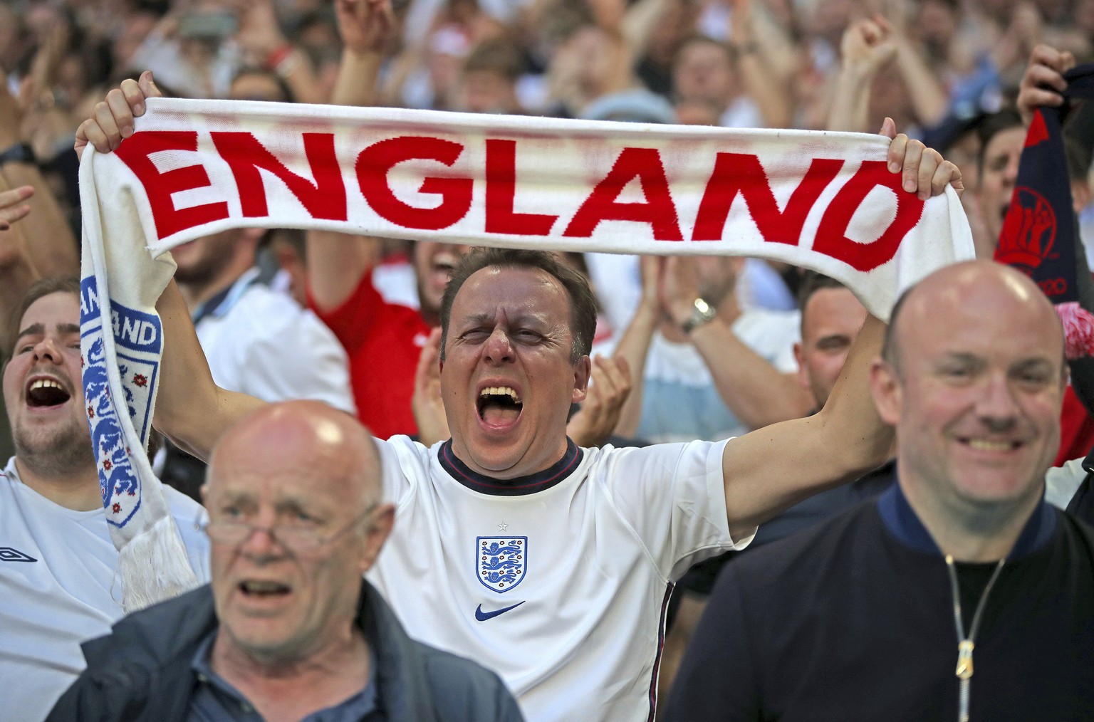 England fans react in the stands prior to the Euro 2020 soccer championship semifinal match between England and Denmark, at Wembley Stadium, in London, Wednesday July 7, 2021. (Nick Potts/PA via AP)