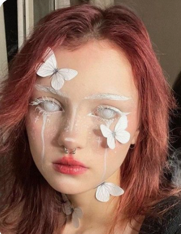 White contact lenses make the look suitable for Halloween.
