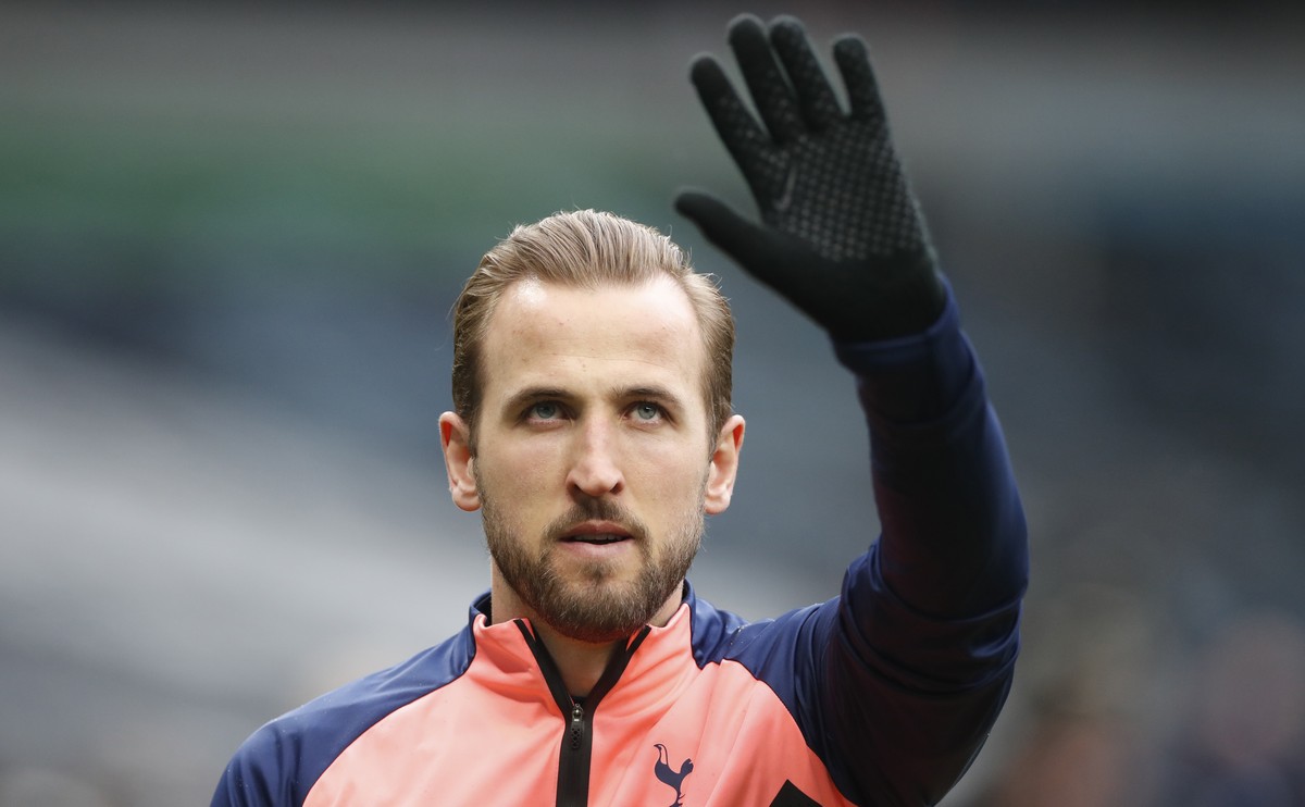 Tottenham's Harry Kane during a warm up before the English Premier League soccer match between Tottenham Hotspur and Aston Villa at the Tottenham Hotspur Stadium in London, Wednesday, May 19, 202 ...