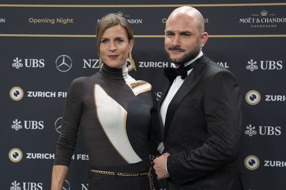 Journalists Cornelia Boesch and Michael Rauchenstein arrive on the Green Carpet at the Opening Night of the 20th Zurich Film Festival (ZFF) in Zurich, Switzerland, on Thursday, October 3, 2024. (KEYST ...