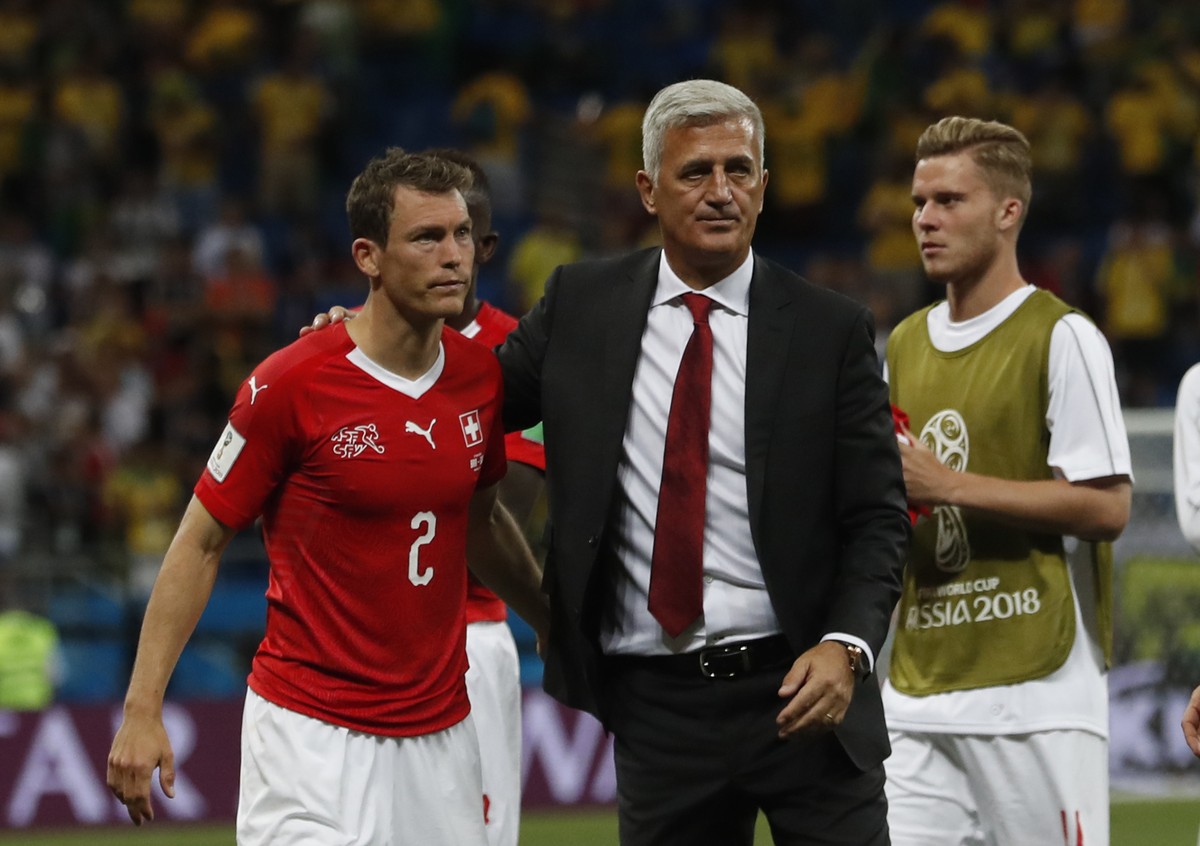 Switzerland head coach Vladimir Petkovic, right, and Switzerland's Stephan Lichtsteiner, left, at the end of the match during the group E match between Brazil and Switzerland at the 2018 soccer W ...