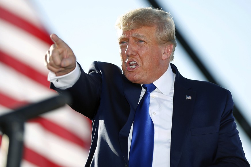 FILE - Former President Donald Trump speaks at a rally at the Delaware County Fairgrounds, April 23, 2022, in Delaware, Ohio. Former President Donald Trump has paid the $110,000 in fines on Thursday,  ...