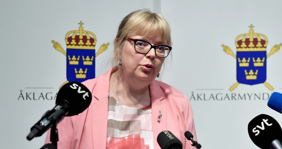 epaselect epa07566735 Sweden's Vice Chief Prosecutor Eva-Marie Persson speaks during a press conference to announced the decision about the preliminary investigation against Julian Assange, in St ...