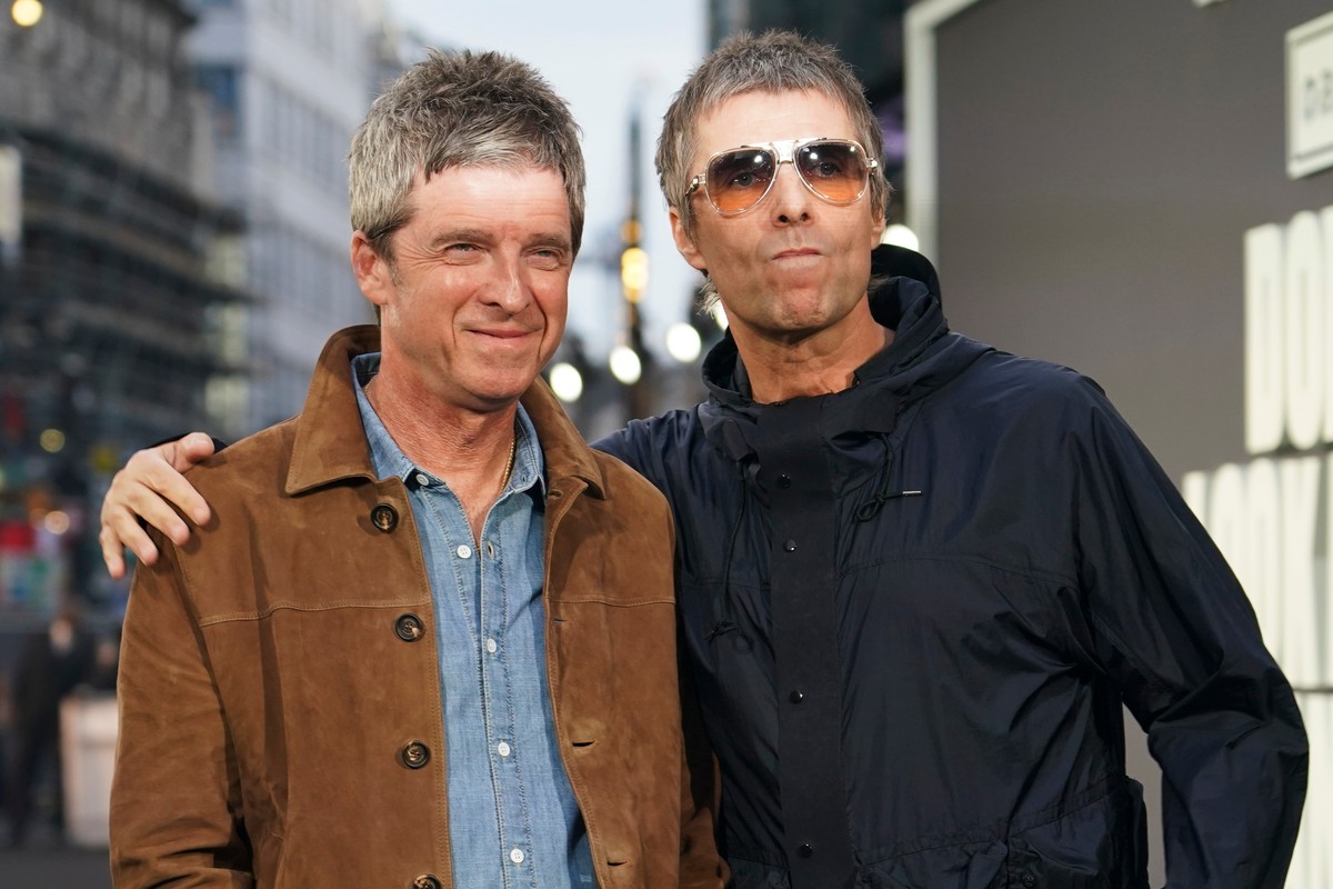 Liam Gallagher, right, and Noel Gallagher pose for photographers upon arrival at the 'Oasis: Don't Look Back In Anger' UK premiere in London, England, Monday, Sept. 7, 2026. (Photo by A ...