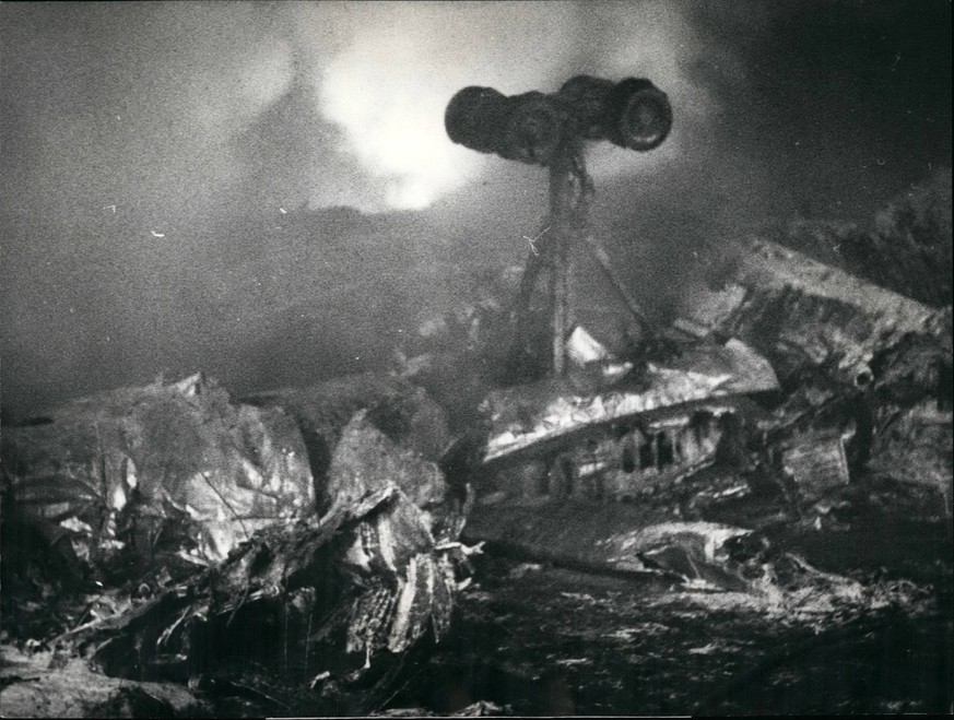Jan. 01, 1971 - A lending gear assembly emerges from the foam covered wrack.: 35 person died when an Ilyushin 18 aircraft of the Balkan-Bulgarian Airlines crashed after missing an approach to Zurich a ...