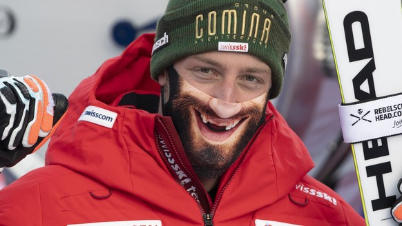Switzerland&#039;s Justin Murisier greets with a special face mask after the men&#039;s giant slalom race at the FIS Alpine Skiing World Cup in Adelboden, Switzerland, Saturday, January 9, 2021. (KEYS ...