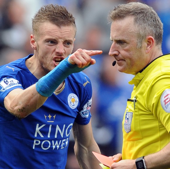 FILE - In this Sunday, April 17, 2016 file photo, Leicester City&#039;s Jamie Vardy gestures to referee Jonathan Moss after being given a second yellow card and sent off during the English Premier Lea ...