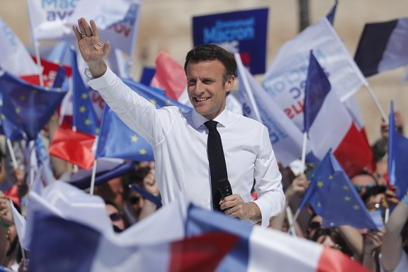 epa09892978 Incumbent French President and candidate for re-election Emmanuel Macron holds a campaign rally in Marseille, France, 16 April 2022. The second round of the French presidential election wi ...