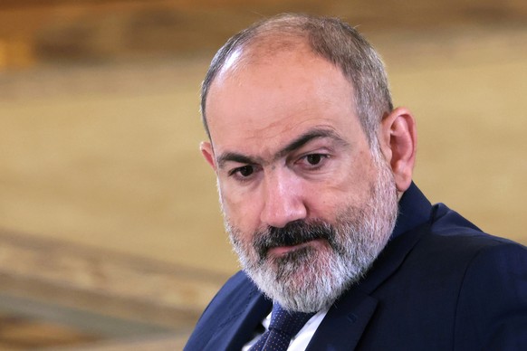 Armenian Prime Minister Nikol Pashinyan attends a trilateral meeting with Russian President Vladimir Putin and Azerbaijani President Ilham Aliyev on the sidelines of the Eurasian Economic Union Forum  ...